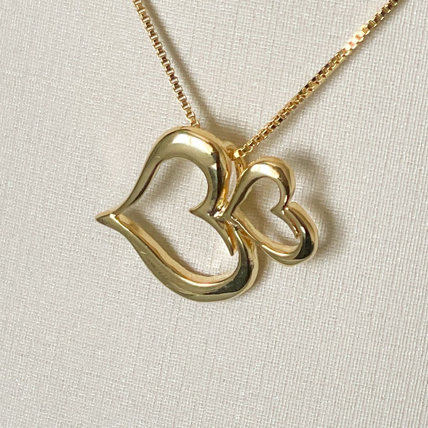COLAR E PINGENTE CORAÇÃO DUPLO  - BANHO DE OURO 18k